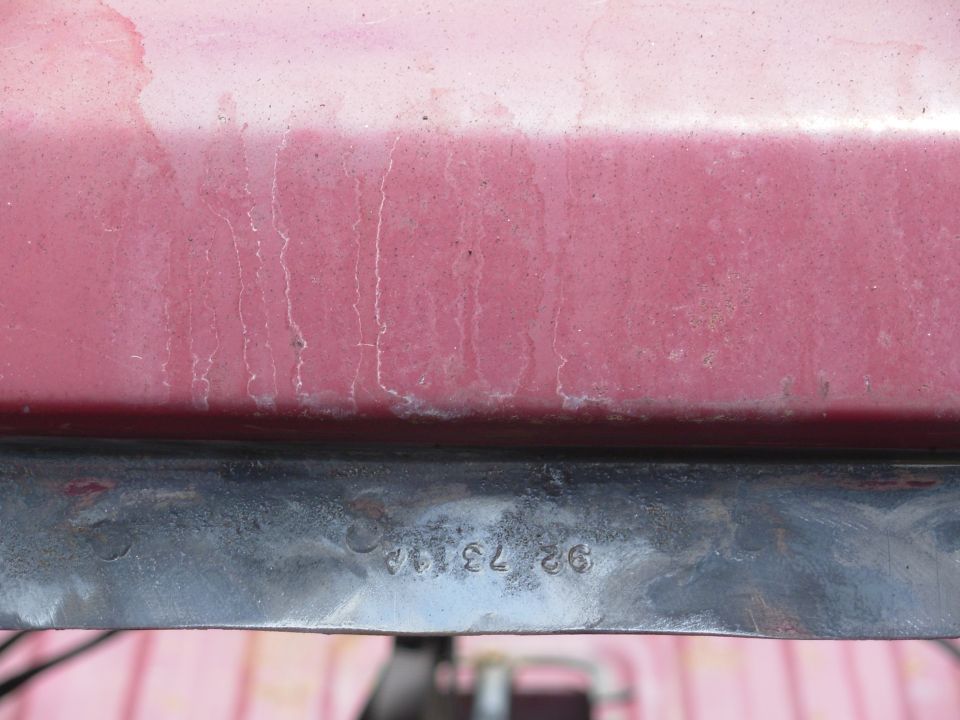 There were obvious indications of ongoing leaks near the firewall, so I removed all the old windshield adhesive.  I didn't notice a date stamp like this on the '82 body I'm currently using.