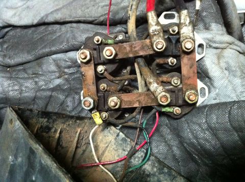 1996 Ford Bronco - This electrical relay shows significant corrosion on its metal components and wiring connections.