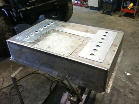1996 Ford Bronco - A custom-fabricated metal fuel tank is shown, likely for an off-road vehicle modification.
