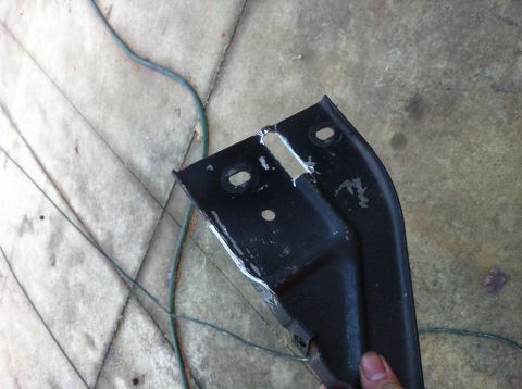 1996 Ford Bronco - This is a modified metal bracket, not a 1996 Ford Bronco engine part.