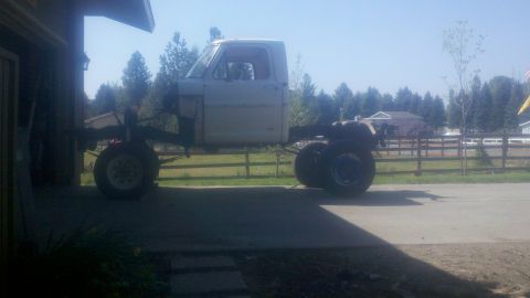 1967 Ford F-250 - Side view of a 1967 Ford F-250 chassis, showing the cab and frame without a bed.