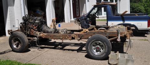 1986 Ford Bronco - This 1986 Ford Bronco is undergoing a major teardown, with its engine and transmission detached from the chassis.
