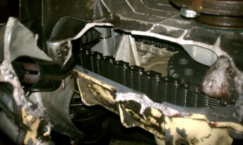 1978 Ford Bronco - Damaged engine timing chain and gears are visible in this close-up mechanical view.