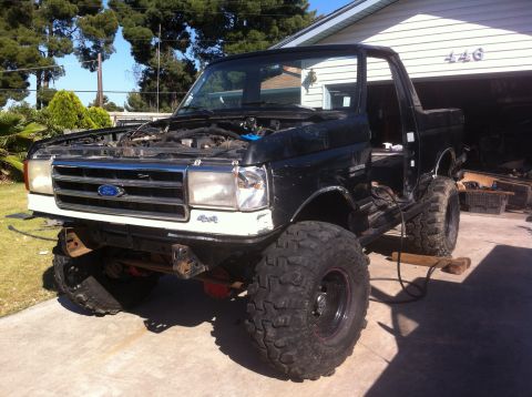 1989 Ford Bronco - This 1989 Ford Bronco is undergoing modifications, a lifted suspension and oversized tires.