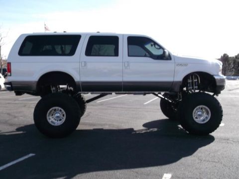 2001 Ford Excursion - This modified 2001 Ford Excursion features an extreme lift kit and oversized wheels, giving it a commanding presence.