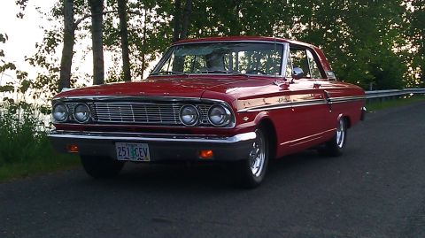 1964 Ford Fairlane - This 1964 Ford Fairlane is seen from the front three-quarter view on a paved road.