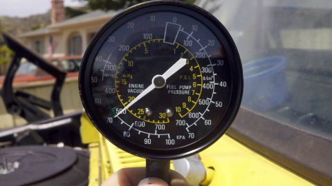 1978 Ford Bronco - A fuel pressure gauge is used to test engine vacuum and fuel pump pressure.
