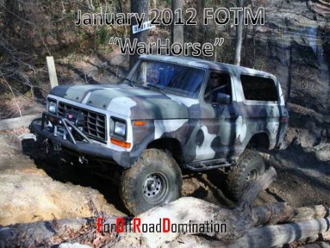 1979 Ford Bronco - This 1979 Ford Bronco, nicknamed 'WarHorse', navigates a challenging off-road course.