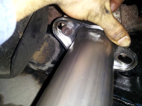 1995 Ford Bronco - driver side, right flange stud is off alignment, or the bassani flange, either or.