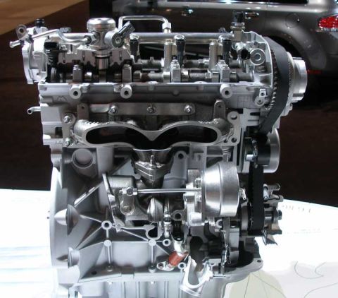 1997 Ford Taurus - Detailed cutaway of an engine, showing internal components and turbocharger assembly.