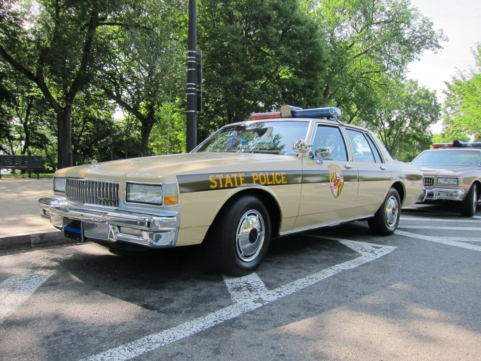 Tan Maryland State Police Chevrolet Caprice sedan parked outdoors