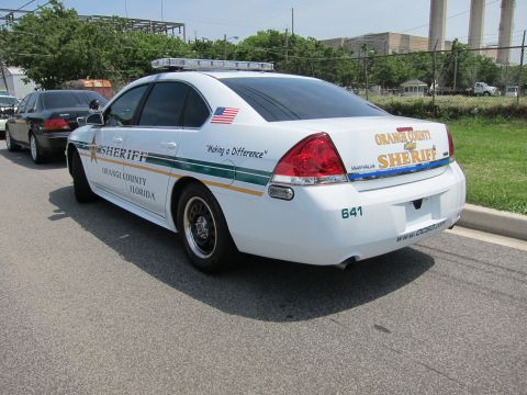 1991 Ford LTD Crown Victoria - Rear view of a white Orange County Florida Sheriff Chevrolet Impala patrol sedan, unit 641.