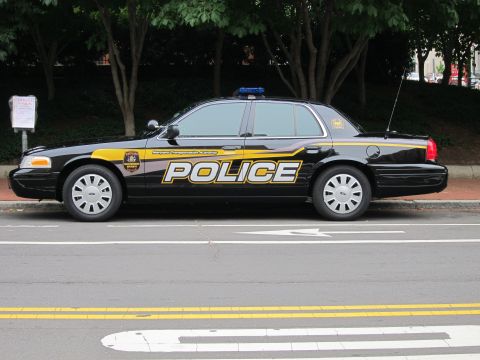 1991 Ford LTD Crown Victoria - black Ford Crown Victoria police car with gold POLICE lettering and Maryland Transportation Authority markings.