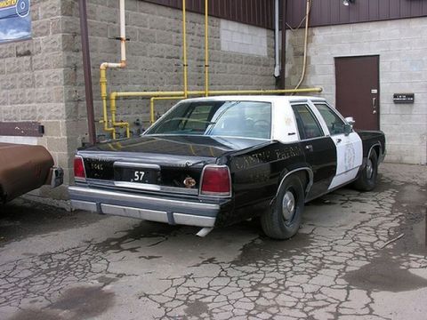 1991 Ford LTD Crown Victoria - This 1991 Ford Crown Victoria police car is seen from the rear, with its distinctive black and white livery.