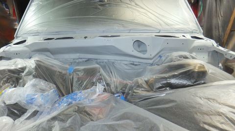 1983 Ford Bronco - Engine bay is prepped and covered for a fresh coat of paint.