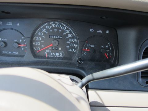 2001 Ford Crown Victoria - The dashboard of a 2001 Ford Crown Victoria displays the odometer reading and various operational gauges.