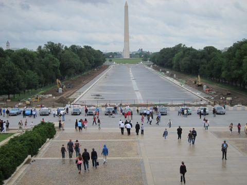 1991 Ford LTD Crown Victoria - Washington Monument seen over a drained reflecting pool, with people walking the plaza steps in the foreground.