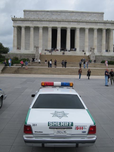 1991 Ford LTD Crown Victoria - green-and-white SHERIFF Crown Victoria parked on the plaza in front of the Lincoln Memorial.
