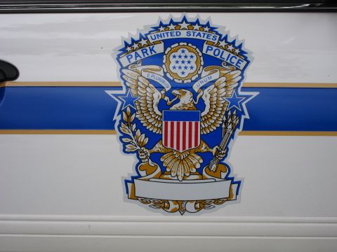 1991 Ford LTD Crown Victoria - Close-up of a United States Park Police door decal featuring a gold eagle over a striped shield.