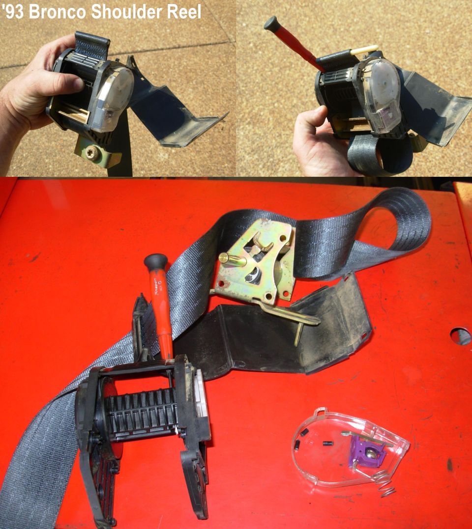 Disassembled seat belt shoulder retractor with black webbing and screwdriver on red surface
