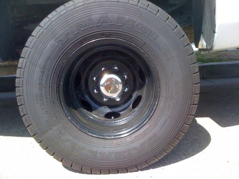 1997 Dodge 3500 - Close-up of a truck wheel and tire, showing the brand and size information.