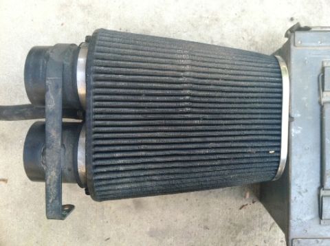 1993 Ford Bronco - This dual air intake filter features a black mesh element and metal clamps, with a Supermotors.net watermark visible.
