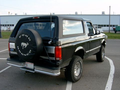1995 Ford Bronco - This 1995 Ford Bronco is shown from the rear three-quarter view, parked in an outdoor lot.
