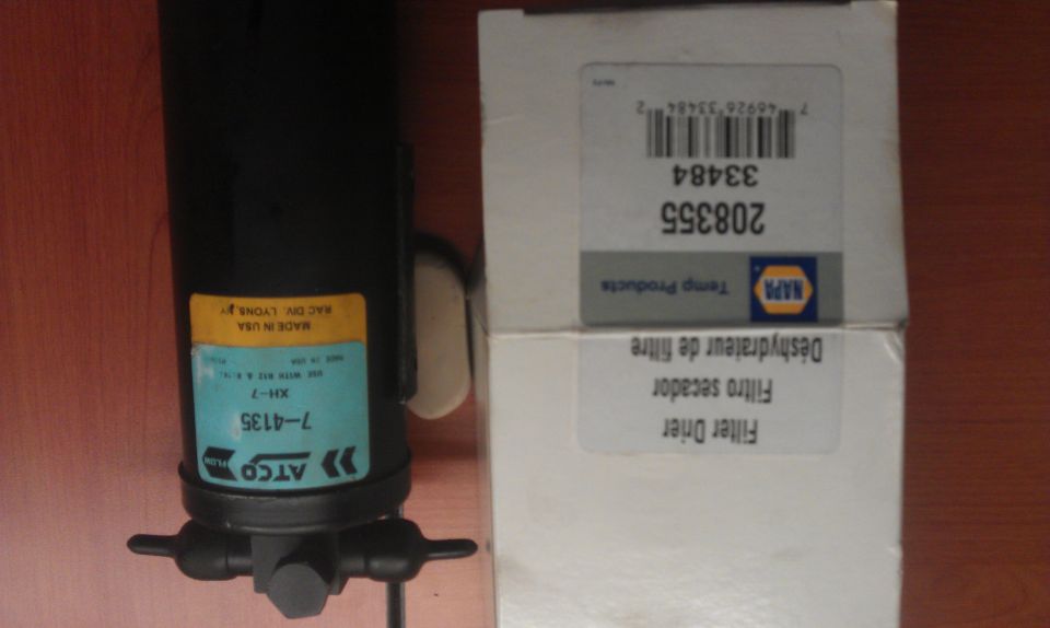 ATCO filter dryer with part number 7-4135 next to NAPA box