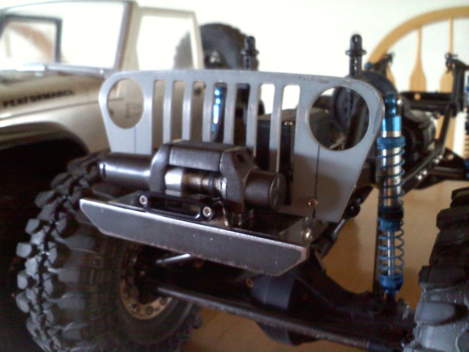 RC car front end with winch and gray grille