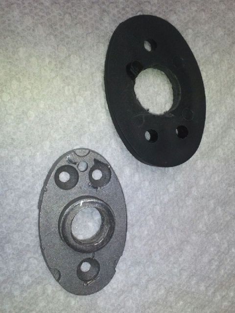 2011 Ford Ranger - Two automotive parts, possibly for a gasket or seal, are shown on a textured background.