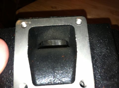 1981 Garelli Rally Sport - This image shows a close-up view of an engine part, likely a cylinder intake or exhaust port, with visible mounting holes.