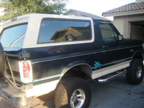 1993 Ford Bronco - This Ford Bronco features a two-tone paint scheme and off-road tires.
