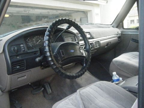1993 Ford Bronco - Interior view of a 1993 Ford Bronco, including the dashboard and seating.