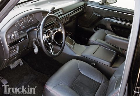 1993 Ford Bronco - The interior of a modified 1992 Ford Bronco shows custom touches like a new steering wheel and console.