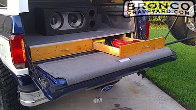 1993 Ford Bronco - This 1993 Ford Bronco features custom storage drawers and a subwoofer installed in the bed.