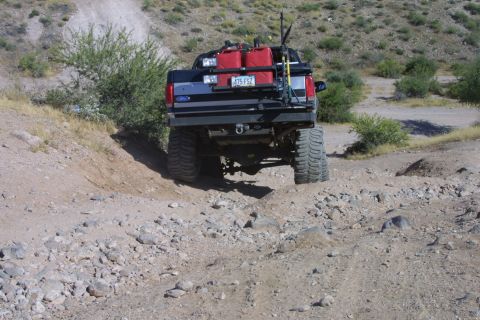 1994 Ford Bronco - This lifted 1994 Ford Bronco is equipped for off-road excursions with auxiliary fuel cans mounted on its rear.