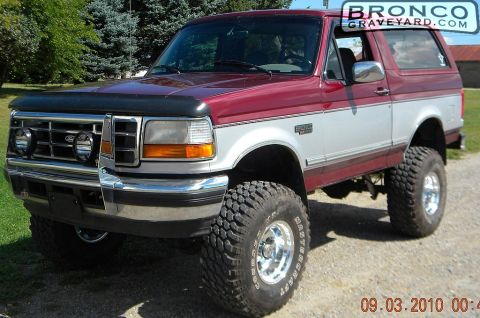 1993 Ford Bronco - This lifted Ford Bronco features a two-tone paint scheme and aggressive off-road tires.