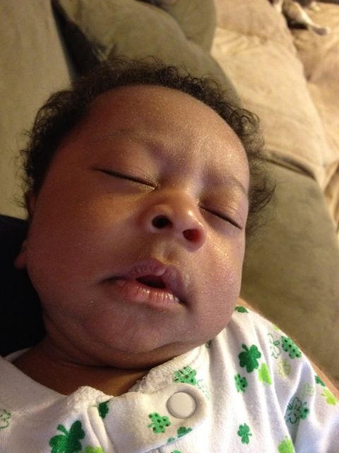 2010 Subaru Legacy - A close-up of a baby sleeping peacefully.