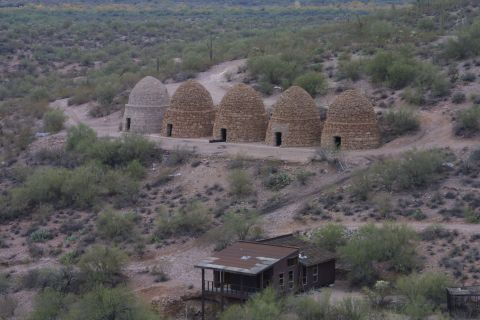 1994 Ford Bronco - Historic coke ovens and an abandoned building are seen in a dry, arid landscape.