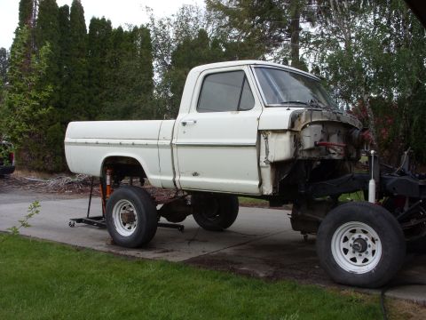1967 Ford F-250 - This truck is missing its front clip and appears to be undergoing some form of repair or restoration.