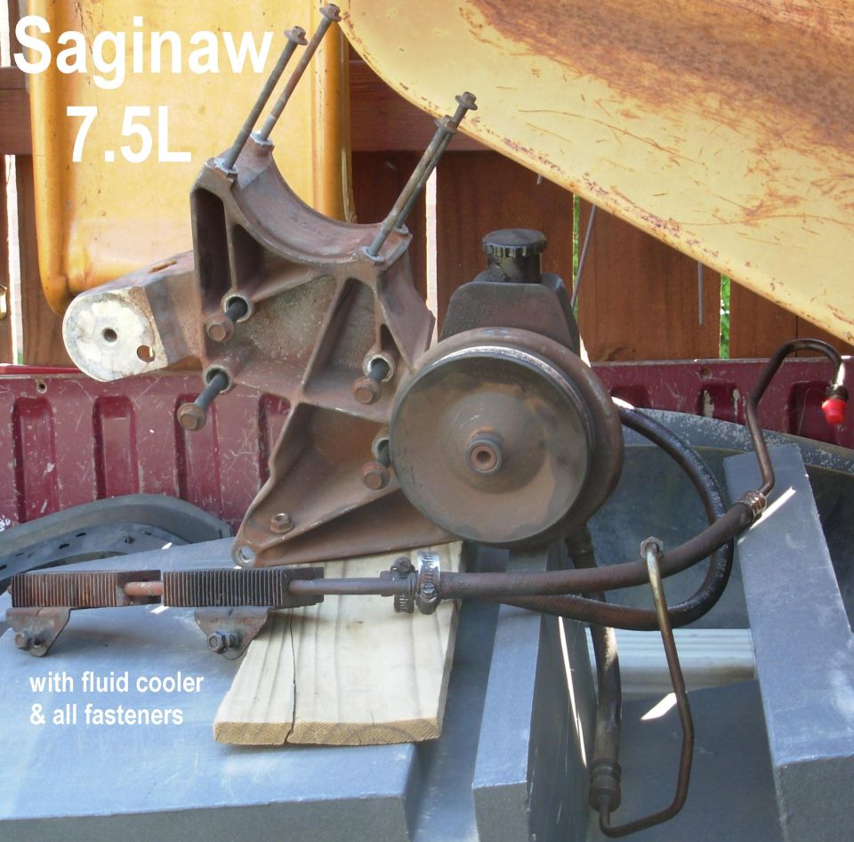 Saginaw power steering pump with bracket, hoses, and finned fluid cooler in a truck bed