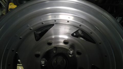 1989 Ford Bronco - Close-up view of a custom aluminum wheel, not identifiable as a 1989 Ford Bronco part.