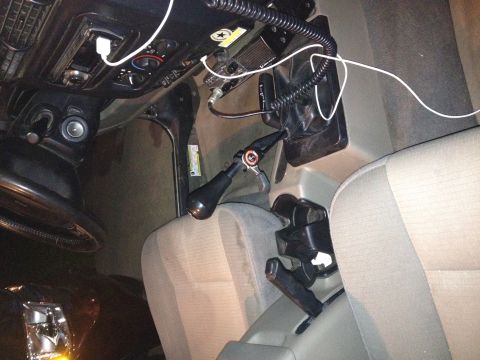 2005 Jeep Wrangler - Interior view of a 2005 Jeep Wrangler, highlighting the hand throttle and CB radio setup.