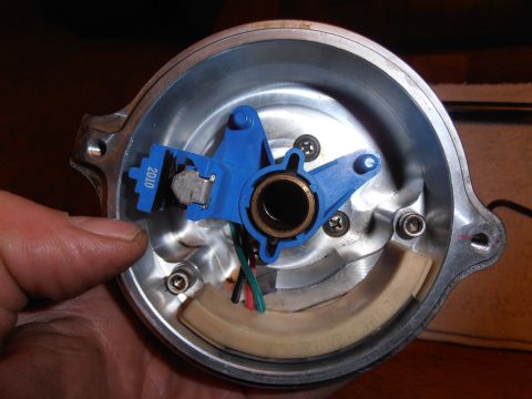 1990 Ford Bronco - Close-up of a PIP sensor assembly, showing internal components and a visible date code.