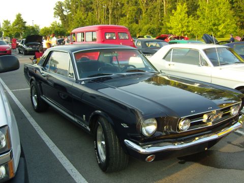2007 Ford Mustang - Classic 1965 Ford Mustang coupe with chrome trim and a distinctive grille.