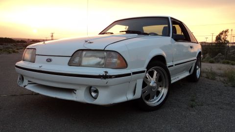 1989 Ford Mustang - This 1989 Ford Mustang GT coupe features a distinctive body style and aftermarket wheels.