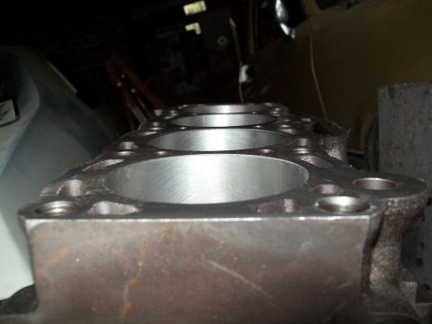 1989 Ford Probe - This engine part shows multiple cylinder bores, indicating it is a component of a larger engine assembly.