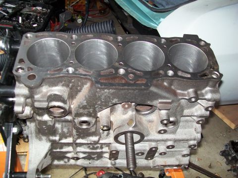 1989 Ford Probe - Close-up of an engine block, showing the four cylinder bores. The registry claims this is a 1989 Ford Probe, but this is unlikely.