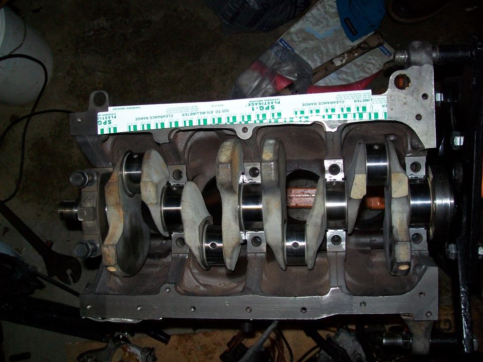 Engine block with crankshaft and plastigage measuring tool