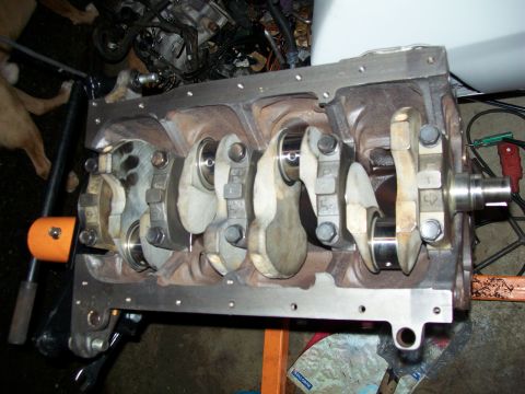 1989 Ford Probe - Close-up view of an engine block's internal components, including the crankshaft and connecting rods.